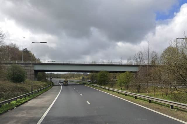 A car flipped onto its roof following a crash on the M58