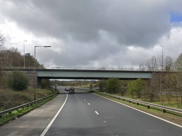 A car flipped onto its roof following a crash on the M58