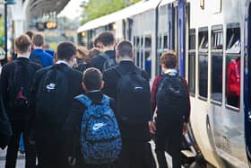 Schoolchildren commuting to school via a Northern train.