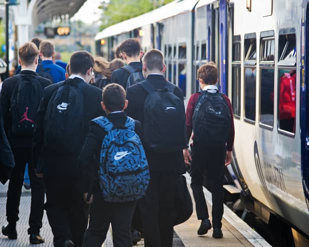 Schoolchildren commuting to school via a Northern train.