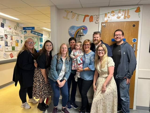 Olivia rings the bell after cancer treatment