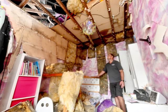 The extensive damage to the family home.