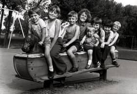Youngsters enjoy the rocking horse in Stanley Park in the 1970s