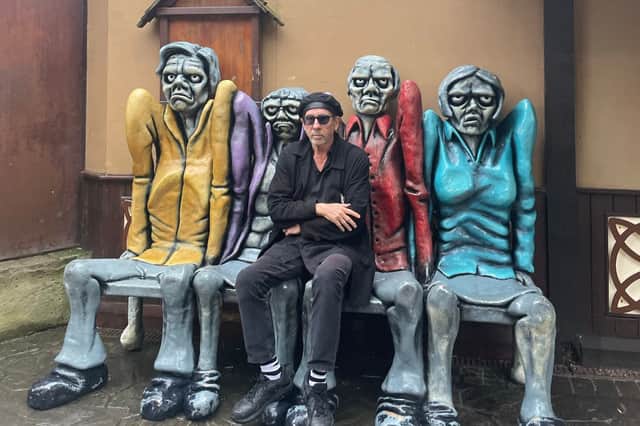 Tim Burton outside the Blackpool Pleasure Beach Ghost Train - the first in the world