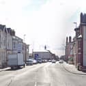 A motorbike crashed into a parked car on Dickson Road in Blackpool