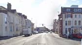A motorbike crashed into a parked car on Dickson Road in Blackpool