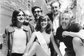 Queen of the Blackpool Lights Pauline Davies, chosen by these Illuminations workers in 1975.
l-r Graham Ogden, George Danier, Ted Bentley, Pauline Davies, Albert Borrowdale and Bert Dilworth.
