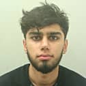 Mohammed Zafar (pictured) has been jailed after crashing his Audi into a police vehicle and injuring officers after travelling the wrong way on roundabout. 