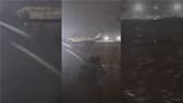 Valencia Airport runway submerged in flood water.