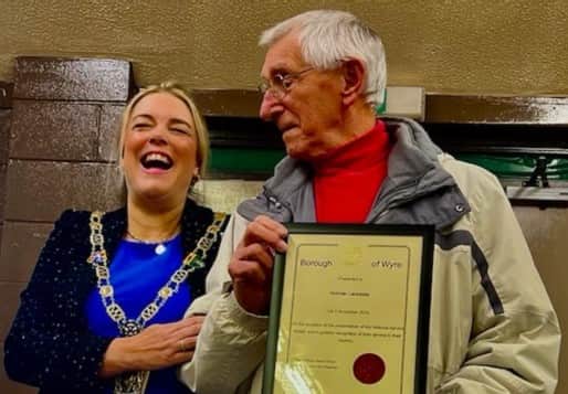 Norman Lancaster receives his National Service Medal from Mayor of Wyre, Coun Jane Preston