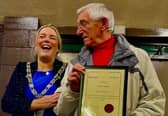 Norman Lancaster receives his National Service Medal from Mayor of Wyre, Coun Jane Preston
