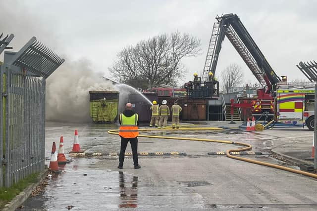 Pictures from the scene show fire crews tackling the blaze inside the compound. Credit: Dave Nelson