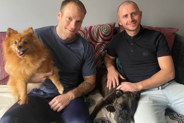 Jacob Peake (left) and Northern Rail colleague Scott Grimes, with pomeranian, Kiki, and Molly in happier times