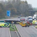 The M6 was closed a after lorry crashed through the central reservation near Preston