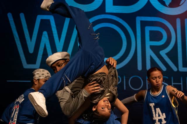 Team Genesis, from the Philippines, compete at the UDO World Street Dance Championships 2024, held at Blackpool Winter Gardens.