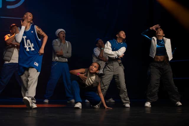 Team Genesis, from the Philippines, compete at the UDO World Street Dance Championships 2024, held at Blackpool Winter Gardens.