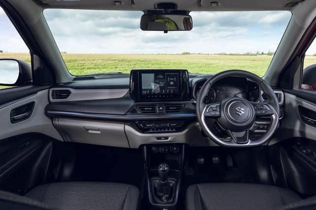 Barring the big display, the interior is a little bit "old school". But that's actually no bad thing