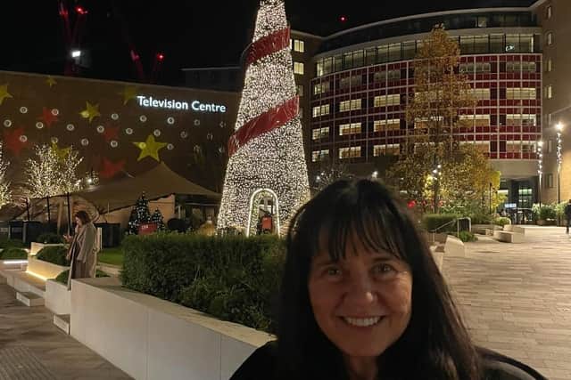 Blackpool's Coleen Nolan poses with the Christmas tree outside the Television Centre, London. Credit: @coleen_nolan on Instagram