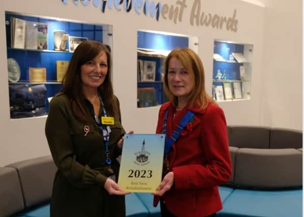 Joan Humble presents the award for Best Refurbishment to Chrisella Morgan (deputy chief operating officer at Blackpool Teaching Hospitals)