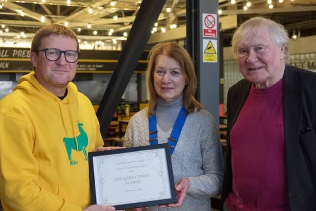 Joan Humble and David O'Hara present the Highly Commended award in the Transforming Blackpool category to James Lucas of Little Blackpool Leisure which operates Abingdon Street Market.
