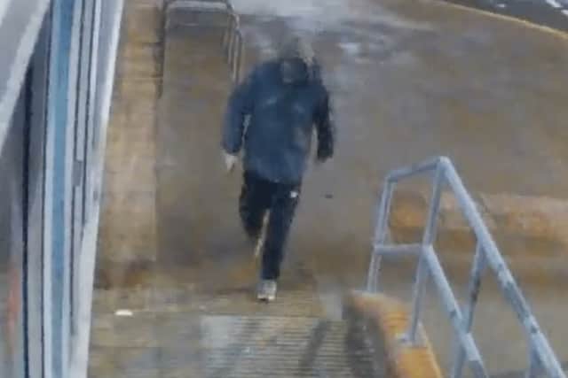 Officers want to speak to this man in connection with two armed robberies at a Co-op store in Blackpool