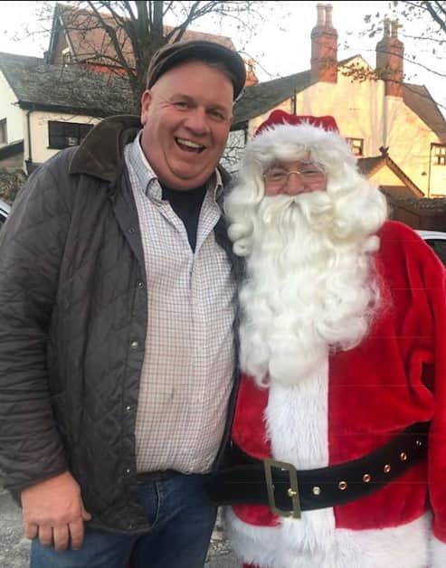 Pete Marquis, seen here with Santa, has delivered more than 2,000 Advent calendars to 15 primary schools in the Fylde area