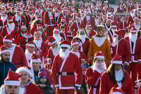 A sea of Santas as hundreds of fundraisers take part in the annual Santa Dash, along Blackpool prom, spreading festive cheer and raising funds for Brian House Children's Hospice.