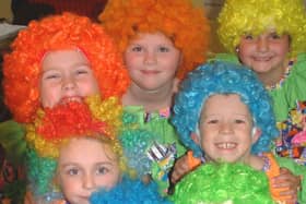 Hannah Everet, Laura Faiers, Claire Widdup, Stephanie Baker, Kane Parker, Alicia Buckley and Chloe Cheyne dressed as clowns for Shakespeare Primary School's Little Voices choir presentation.