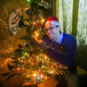 Ross Shaddick from Plymouth, Devon, with his Christmas lights which have finally gone out after 54 years.