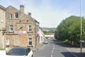 An electric bike rider died after a crash with a BMW outside the Coal Clough pub in Burnley.