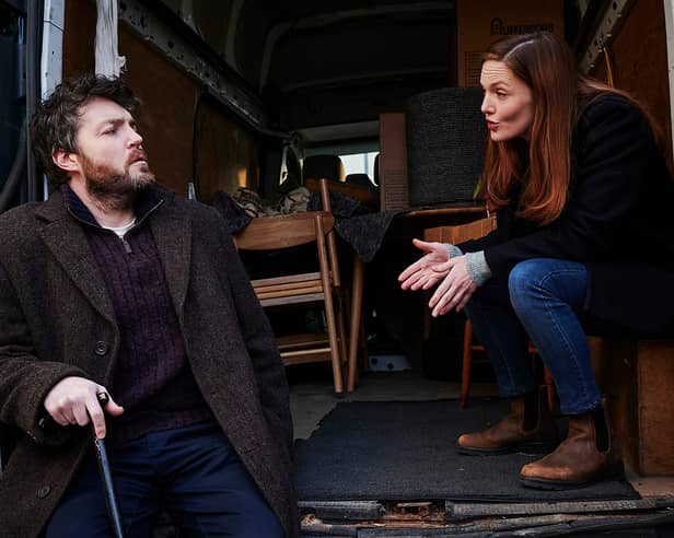 Tom Burke (L) and Holliday Grainger (R) in Strike. 