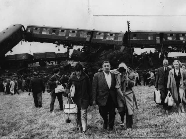16th July 1961:  Survivors stumble away from the wreckage of the crashed Blackpool holiday train. Six people were killed and 120 injured.  (Photo by Keystone/Getty Images)