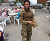 Michelle Keegan takes a break while filming in Fleetwood for drama series Our Girl, 2016