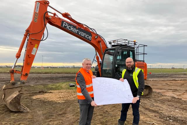 Coun Mark Smith and Chris Holme from Prospect Developments at the site where construction has begun