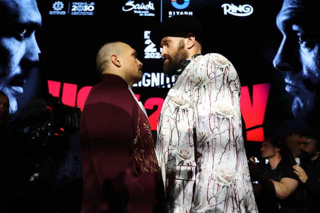 Tyson Fury (R) and Oleksandr Usyk face off ahead of their IBF, IBO, WBA, WBC and WBO Undisputed World Heavyweight Title fight this weekend. Credit: Richard Pelham/Getty Images
