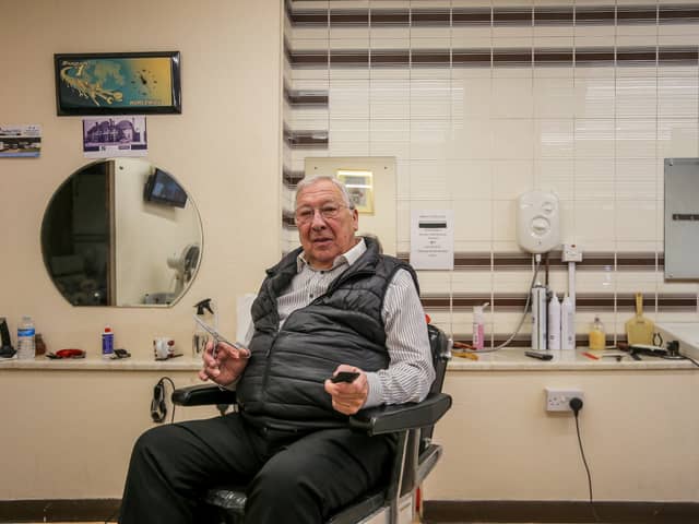Melvin Eley at his barbershop in Stechford, Birmingham.