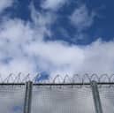 Drones dropping drugs and weapons to dangerous prisoners being held in high-security jails are a "threat to national security", a watchdog has warned