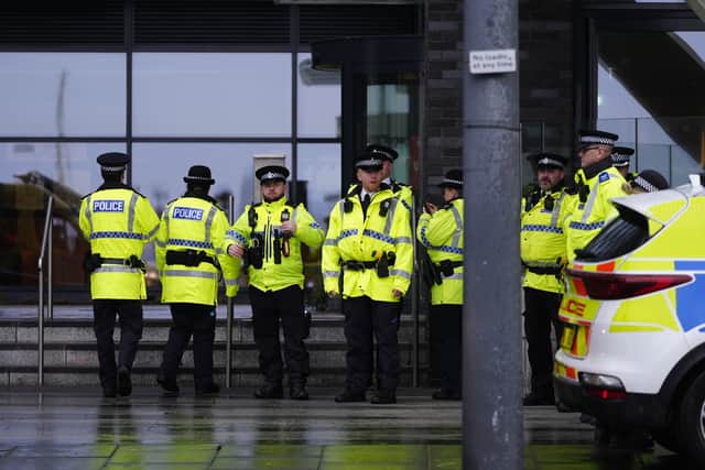 A heavy police presence outside Liverpool Crown Court where Axel Rudakubana, 18, pled guilty to three counts of murder and ten attempted murders.