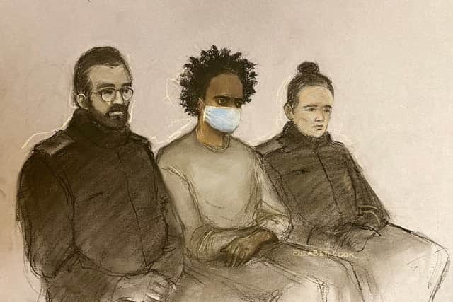 Axel Rudakubana, 18, appearing on the first day of his trial at Liverpool Crown Court, where he pleaded guilty to murdering three young girls in a knife attack
