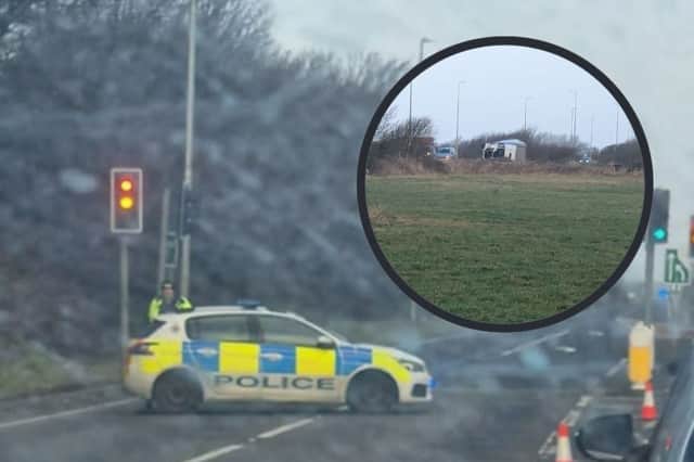 Police at the scene in Amounderness Way, Fleetwood where a HGV has blown over, blocking the road this morning (January 24)