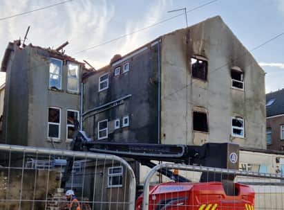 The rear of the Strand Lodge shows the damage from the fire