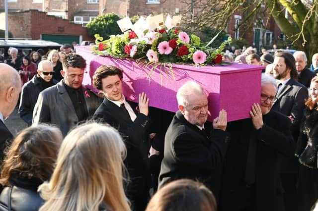 Linda Nolan's coffin is carried into the church im Blackpool