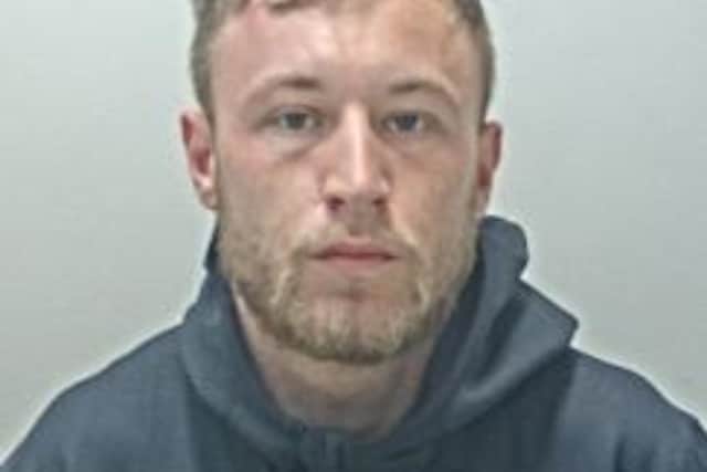 Kieran Mills is wanted in connection with an investigation into stalking, harassment and threats to damage