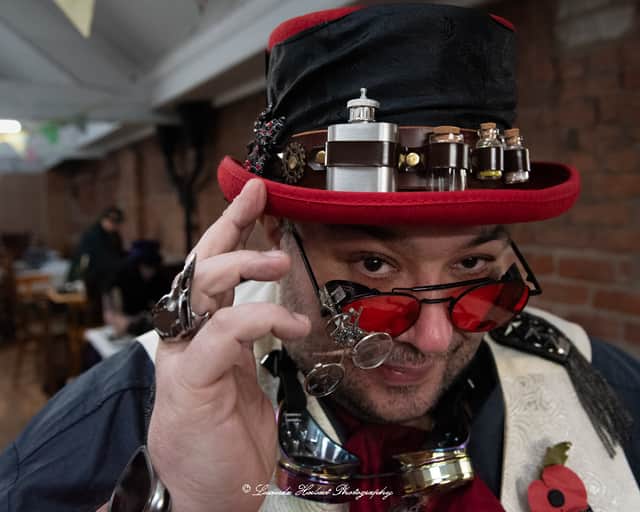 Paul Lewis shows off his medicine-themed Steampunk accessories at Bygone Times