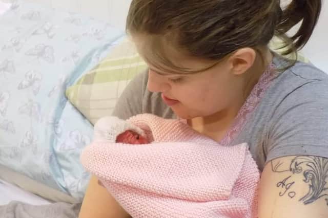 Kay with Keira in her arms