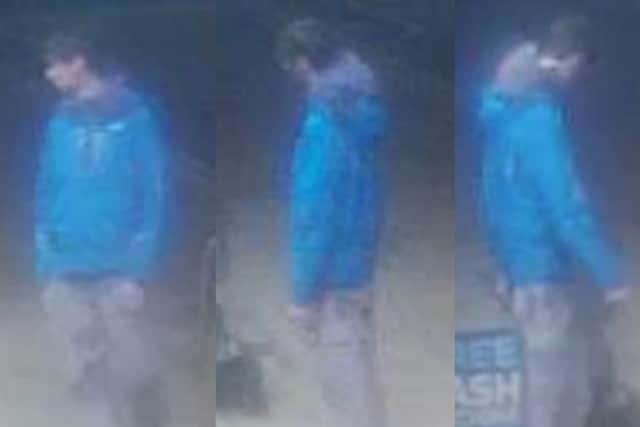 A man is wanted by police following a robbery at a cash machine in Blackpool