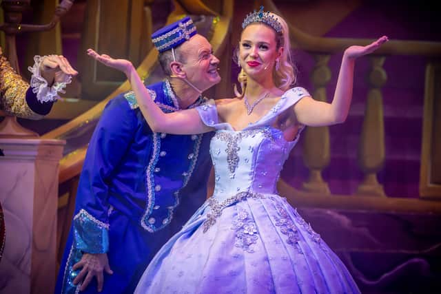 Steve Royle as Buttons and Kitty Harris as Cinderella.