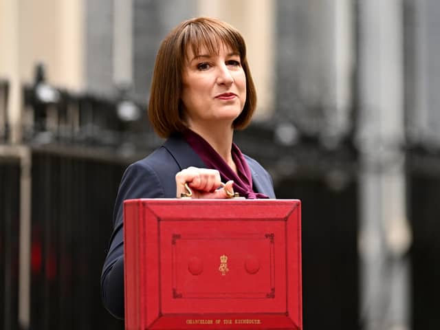 Rachel Reeves, poses with the red Budget Box as she leaves 11 Downing Street to present the government's annual budget to Parliament in October 2024 (Photo: Leon Neal/Getty Images)