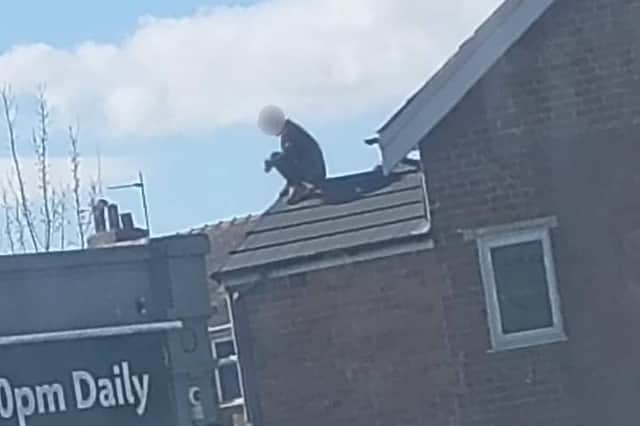 Police and fire crews were called to reports of a man on a roof in Preston Old Road, Blackpool