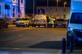 Police at the scene in Dickson Road, Blackpool where a man in his 40s was seriously assaulted at around 1.30am on Saturday (March 15)